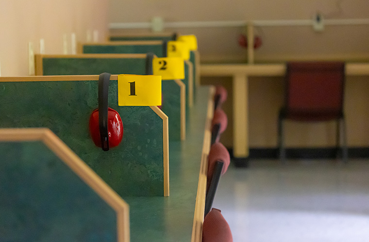 UL Lafayette Disability Services Testing desks with headphones